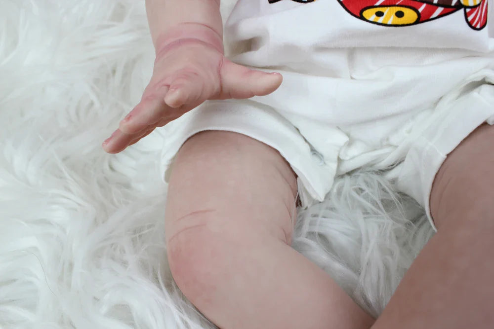 "Logan" – The Soft Touch 24-inch Reborn Baby Doll with Lifelike Details