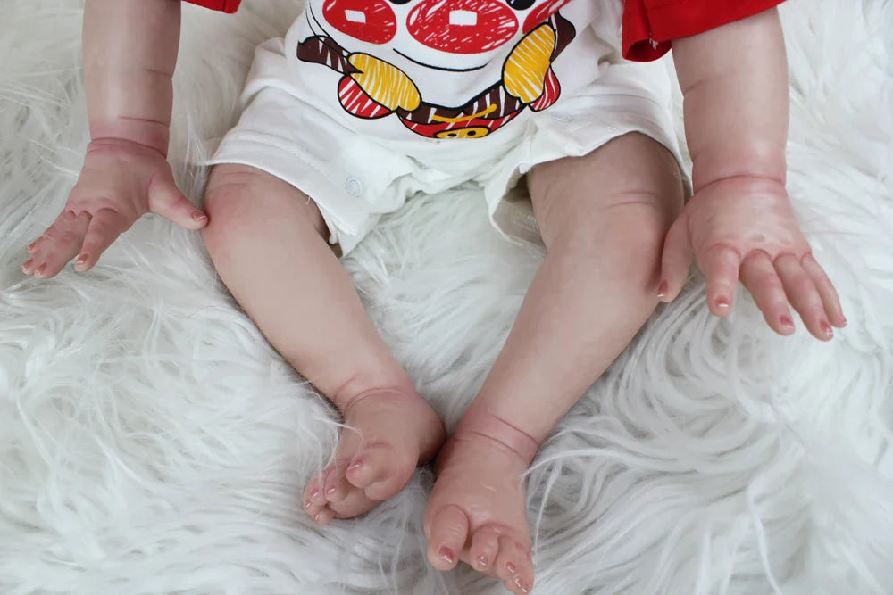 "Logan" – The Soft Touch 24-inch Reborn Baby Doll with Lifelike Details