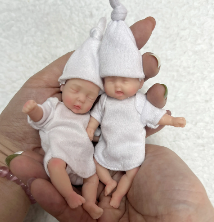 Mini Reborn Girl Doll with 2 Outfits - 4-Inch Soft Silicone Collectible